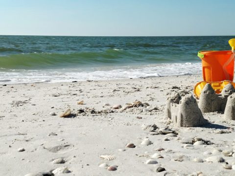 Sandcastles and sand toys on the beach